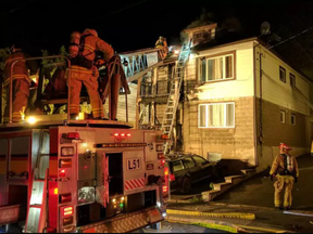 Firefighters at a two-alarm fire in Vanier early Saturday, May 20. (SCOTT STILBORN, Ottawa Fire Services)