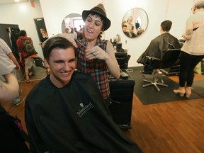 Mindy Robinson cuts Eric Stevenson's hair during the 24 Hour Cut-A-Thon To Raise Funds And Assistance For Winnipeg's homeless. Event took place at Urban Crush Salon in Support of Morberg House, Winnipeg. Saturday, May 20, 2017. Chris Procaylo/Winnipeg Sun/Postmedia Network