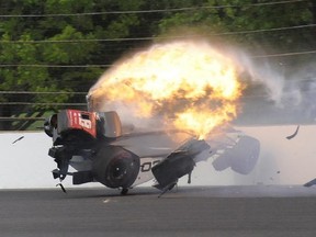 The car driven by Sebastien Bourdais hits the wall and bursts into flames in the second turn during Indianapolis 500 qualifying at Indianapolis Motor Speedway on Saturday, May 20, 2017. (Greg Huey/AP Photo)
