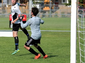 Chris Abbott/Tilllsonburg News
Glendale's Lucas Deutsch heads the ball over the IDCI goalie to tie Wednesday's TVRA SouthEast semifinal soccer game in the final minute of regulation. The Gemini went on to score twice in overtime to beat Ingersoll 4-2.