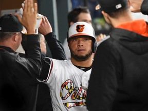 Welington Castillo celebrates his 3-run homer against the Jays last night. (AP)