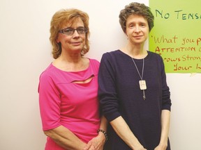 Cindy Hoerger, a health and life coach, left, stands with Wendy Theodore, community liaison for Vulcan and Region Family and Community Support Services.
