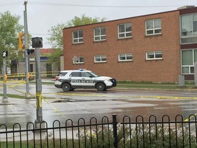 Police cruiser and police tape blocks off the intersection of Cumberland and Carleton in Winnipeg, the scene of a motor vehicle collision involving a pedestrian at around 3:15 a.m. on Sunday, May 21, 2017. A 30-year-old man died in hospital after being struck by a car. GLEN DAWKINS/Winnipeg Sun/Postmedia Network.