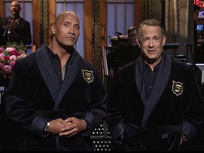 Dwayne "The Rock" Johnson (L) and Tom Hanks during Johnson's opening monologue of the 42nd season finale of  "Saturday Night Live" on May 20, 2017. (Video screenshot)