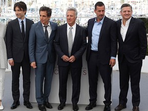 Actress Emma Thompson, from left, director Noah Baumbach, actors Ben Stiller, Dustin Hoffman, Adam Sandler and Netflix CEO Ted Sarandos pose for photographers during the photo call for the film "The Meyerowitz Stories" at the 70th international film festival, Cannes, southern France, Sunday, May 21, 2017. (AP Photo/Alastair Grant)