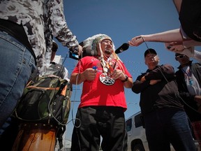 Grand Chief Derek Nepinak of the Assembly of Manitoba Chiefs speaks to media before leading The Treaty Caravan out of Headingley which is just outside Winnipeg on June 6, 2013. A Manitoba indigenous leader plans to walk 120 kilometres next month in a decidedly different commemoration of Canada's 150th birthday. Derek Nepinak, grand chief of the Assembly of Manitoba Chiefs, said his Walk to Remember is to celebrate the resilience of indigenous people in the face of what has happened to them since Confederation. THE CANADIAN PRESS/John Woods