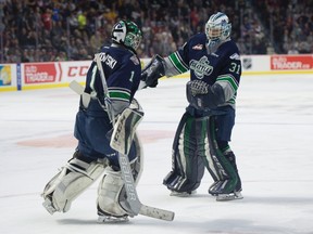 Seattle Thunderbirds goalie Carl Stankowski (1) leaves the ice as he is replaced by Rylan Toth during first period Memorial Cup round robin action against the Windsor Spitfires in Windsor, Ont., on Sunday, May 21, 2017. (Adrian Wyld/The Canadian Press)
