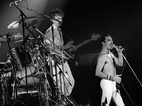 A picture taken 18 September 1984 shows rock star Freddie Mercury, lead singer of the rock group "Queen", during a concert at the Palais Omnisports in Paris. (Coutausse/AFP/Getty Images)