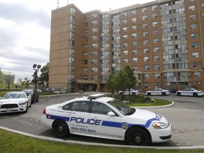 Peel Regional Police at the scene at 20 Ceremonial Dr. in Mississauga on Monday, May 22, 2017 after a woman's body was found. (Michael Peake/Toronto Sun)