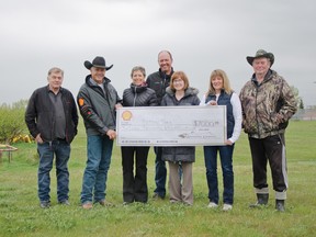 L to R: MD Councillor Terry Yagos, Kathy Rast, Kyle Rast, Tanya Douglas, Karina Cail and Dennis Olson were presented a generous donation of $7,000 from Shell Waterton Complex and community liaison Rod Sinclair, second from left, to go towards funding the revitalization of Patton Park. | Caitlin Clow photo/Pincher Creek Echo