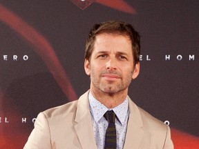 In this June 17, 2013 file photo, director Zack Snyder attends spanish premiere of the film "Man of Steel" in Madrid. The recent death of director Zack Snyder’s daughter has driven the prominent filmmaker to step away from finishing the ensemble superhero movie “Justice League.” Warner Bros. Pictures president Toby Emmerich said on Monday, May 22, 2017, that director Joss Whedon would take over the post-production process for the film, which should stay on track for a Nov. 17 release. (AP Photo/Abraham Caro Marin, File)