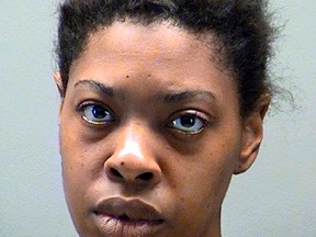 This undated photo released by the Montgomery County Jail in Dayton, Ohio, shows Claudena Helton, arrested Thursday, May 18, 2017, and accused of shooting two of her children in the head and leaving them outside their home. (Montgomery County Jail via AP)