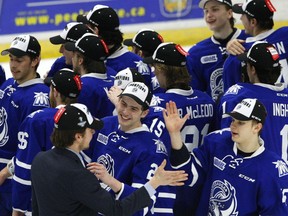 Mississauga Steelheads players celebrate a win over the Peterborough Petes during Game 4 of the Eastern Conference final on April 26, 2017 at the Hershey Centre in Mississauga, Ont. (CLIFFORD SKARSTEDT/POSTMEDIA NETWORK)