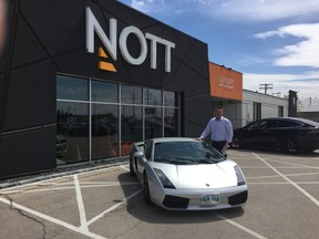 Nott Autocorp president Trevor Nott stands beside Lamborghini Galardo Coupe, one of eight cars being offered for rental through the Exotic Driver's Club which gives Winnipeg drivers an opportunity to rent and drive exotic cars.  
JASON FRIESEN/Winnipeg Sun