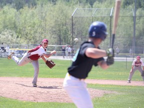 St. Charles Cardinals Braeden Gobbo pitches to J. Grylls of École secondaire de l'Horizon during boys high school baseball action from the Terry Fox Sports Complex in Sudbury, Ont. on Tuesday May 24, 2016. .Gino Donato/Sudbury Star/Postmedia Network