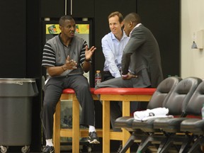 At Toronto Raptors training camp in the Air Canada Centre Raptors brain trust assembles, left to right, as head coach Dwane Casey, assistant GM Jeff Weltman, and GM Masai Ujiri, in downtown Toronto on Dec. 9, 2009. (Stan Behal/Toronto Sun)