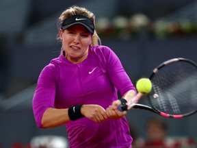 Eugenie Bouchard of Canada in action against Svetlana Kuznetsova of Russia on Day 6 of the Mutua Madrid Open at La Caja Magica on May 11, 2017. (Clive Rose/Getty Images)