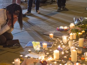 People of Manchester pay their respects at a candle lit vigil in Albert's Square on Tuesday, May 23, 2017. (WENN.com/PHOTO)