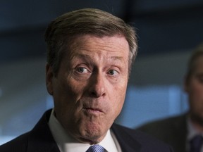 Mayor John Tory says the city has coughed up nearly $1 billion for repairs to TCHC buildings all over Toronto, the feds have “stepped up too,” but that Premier Kathleen Wynne’s government has given nothing to date. (TORONTO SUN/FILES)