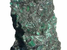 This photo released by the Bahia Mineral Cooperative shows a 4.3-foot tall emerald weighing more than 600 pounds in Bahia, Brazil, Monday, May 22, 2017. Paulo Santana of Brazil's National Mineral Production Department said the emerald was found about 20 days ago by miners of the Bahia Mineral Cooperative, but would not estimate the value of the emerald. It was sold to a mine owner in the region. (Bahia Mineral Cooperative via AP)