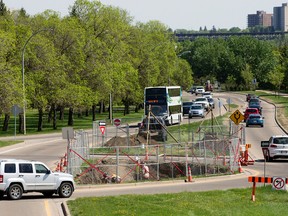 Crews conduct an archeological dig in the median of River Valley Road near the Groat Bridge in Edmonton Tuesday, May 23, 2017.