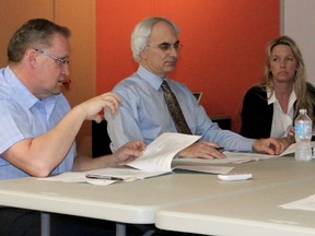 BRUCE BELL/THE INTELLIGENCER
Belleville staff members (from left) Rod Bovay, director of engineering, Ray Ford, deputy director/manager of engineering, and Dana Barnett, the city’s capital projects co-ordinator, discuss parking in the downtown core with members of the Mayor’s Implementation Team on Thursday morning.