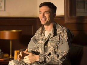 This image released by Netflix shows Topher Grace in a scene from "War Machine." Grace stars opposite Brad Pitt in the streaming service's original new military satire "War Machine," which hits Netflix in Canada on Friday. THE CANADIAN PRESS/AP-Francois Duhamel/Netflix via AP
