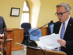 TIM MEEKS/THE INTELLIGENCER
Belleville Mayor Taso Christopher, left, looks on Wednesday morning at City Hall as Bay of Quinte MP Neil Ellis announces $3,306,083 in federal infrastructure funding for clean water and waste water projects for the City of Belleville.