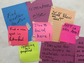 Sticky notes left at a Belvedere open house illustrate the neighbourhood's frustration with this supportive housing proposal. (Elise Stolte/Edmonton Sun)