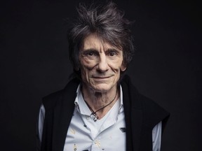 In this Nov. 14, 2016 file photo, Ronnie Wood of the Rolling Stones poses for a portrait in New York. A spokesperson for Ronnie Wood confirmed Wednesday, May 24, 2017, that during a recent routine medical screening, doctors discovered a small lung lesion which was successfully treated. The band's upcoming tour will not be affected. (Photo by Victoria Will/Invision/AP, File)