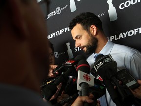 Clarke MacArthur of the Ottawa Senators talks to the media before boarding the plane at the Ottawa International Airport on May 24, 2017. (Jean Levac/Postmedia)