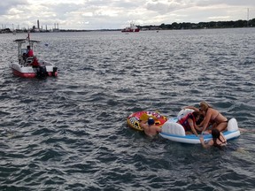 Float Down participants get help from a vessel involved in the multi-agency response during last year's events.(Submitted photo Carol Launderville, Fisheries and Oceans Canada)