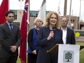 MP Peter Fragiskatos, left, MPP Deb Matthews and Mayor Matt Brown flank MP Kate Young during Wednesday?s announcement of $36 million in federal, provincial and municipal funding for a raft of projects to protect and improve water quality, at the Greenway Pollution Control Centre in London. (Derek Ruttan/The London Free Press)