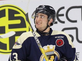 Windsor Spitfires’ Gabriel Vilardi of Kingston stretches during the warmup prior to Memorial Cup round-robin action in Windsor on Friday. Windsor coach Rocky Thompson is using forward Vilardi as much as possible, but the top prospect had to be willing to adapt to make it happen. (Dave Chidley/The Canadian Press)