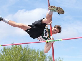 Julian Simeoni clears the bar during the pole vault at the NOSSA track and field championships in Sudbury, Ont. on Wednesday May 24, 2017. Gino Donato/Sudbury Star/Postmedia Network