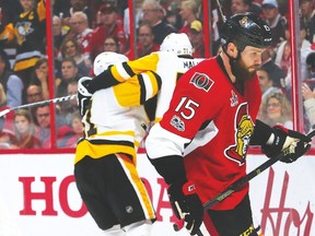 Sens forward Zack Smith looks despondent after Penguins’ Evgeni Malkin (centre) scored Pittsburgh’s lone goal in Game 6 on Tuesday. Smith is looking to better handle Malkin in Game 7. (Tony Caldwell/Ottawa Sun)