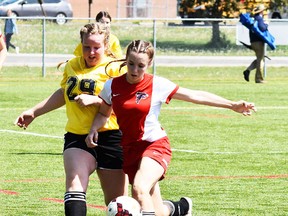Action from COSSA A girls soccer competition Wednesday at MAS Park Field 2 between St. Paul's (red) and Lindsay St. Thomas Aquinas. (Cliff Malone for The Intelligencer)