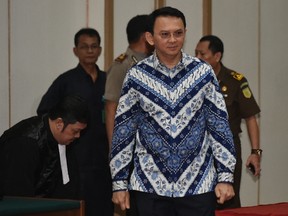 BAY ISMOYO/Getty Images
This file photo taken on May 9 shows Jakarta’s Christian governor Basuki Tjahaja Purnama, popularly known as Ahok, arriving at a courtroom for his verdict and sentence in his blasphemy trial in Jakarta. Jakarta’s jailed Christian governor on May 22 appealed his conviction for blaspheming Islam, his legal team said, as the United Nations stepped up pressure on Indonesia to overturn the controversial sentence.