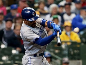 Devon Travis of the Toronto Blue Jays hits a home run in the sixth inning against the Milwaukee Brewers at Miller Park on May 24, 2017. (Dylan Buell/Getty Images)