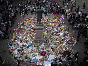 The carpet of floral tributes to the victims and injured of the Manchester Arena bombing covers the ground in St Ann's Square on May 25, 2017 in Manchester, England. An explosion occurred at Manchester Arena as concert goers were leaving the venue after Ariana Grande had performed. Greater Manchester Police are treating the explosion as a terrorist attack and have confirmed 22 fatalities and 59 injured. (Photo by Christopher Furlong/Getty Images)