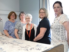 The volunteer palliative care support team at Tillsonburg District Memorial Hospital includes Catherine Burke, Sharon Hagell, Elaine Hallett, Carol Wellhauser, and on the far right, Ann Marie Wallace-Phillips, coordinator of hospice and bereavement services for VON Oxford. (Chris Abbott/Tillsonburg News)