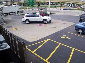 Melissa Smith jumped on the hood of her SUV during an attempted carjacking at a Milwaukee gas station on Tuesday. (Melissa Smith/Facebook Video screenshot)