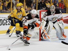 Anaheim Ducks defenceman Sami Vatanen tries to clear the puck in front of goalie John Gibson and Nashville Predators left winger Filip Forsberg during Game 3 of the Western Conference final on May 16, 2017. (AP Photo/Mark Humphrey)
