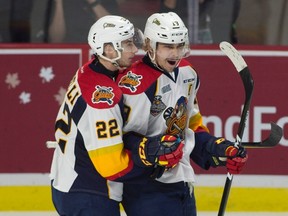 Erie Otters centre Anthony Cirelli congratulates Dylan Strome on his goal during Memorial Cup action against the Saint John Sea Dogs in Windsor on May 22, 2017. (THE CANADIAN PRESS/Adrian Wyld)