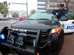 Edmonton Police Service Cst. Scott Anthony with the Ford Police Interceptor Utility (Explorer) in Edmonton, October 10, 2012. The service is six years into the new generation of police vehicles after Ford retired the Crown Victoria. In that time, the SUVs have grown to almost 90 per cent of the EPS's patrol fleet.