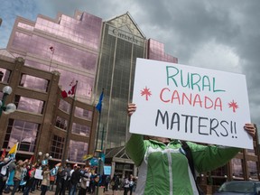 About 200 protesters gathered in front of Canada Place on May 24, 2017 to rally on behalf of the 300 workers at the he Case Processing Centre in Vegreville that the federal government plans to close  and move operations to Edmonton.