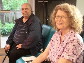 Linda Doughty and Mike Burgess, two London and Middlesex Housing Corp. tenants in London, are receiving cut-rate, high-speed Internet service through a program operated by Rogers Communications. (Shalu Mehta/The London Free Press)