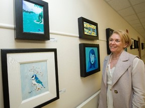 Dr. Jan Banasch, Grey Nuns Hospital, Department of Psychology Site Chief, poses for a photo in the newly opened gallery featuring art created by artist who have experienced mental illness, at the Grey Nuns Hospital in Edmonton Thursday May 25, 2017.