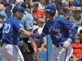 Josh Donaldson (left) and Troy Tulowitzki might be back in action on Friday when the Blue Jays face the Rangers. (CHRIS O'MEARA/AP file photo)