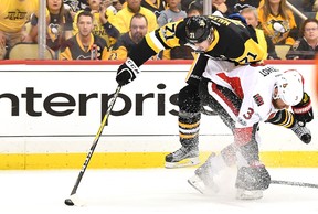 The Pittsburgh Penguins bench skates toward Pittsburgh Penguins goalie Matt  Murray (30) to celebrate their 7-0 win against the Ottawa Senators in game  five of the Eastern Conference Finals of the Stanley